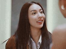 a woman with long brown hair is smiling and looking at another woman with justjaycee tumblr written below her