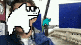 a man wearing a blue jacket has a pixelated image of a dog behind his face
