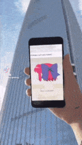 a person is holding a cell phone with a drawing of a girl on the screen .