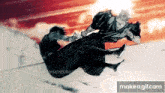 a man is holding another man 's hand while they are fighting in the air .