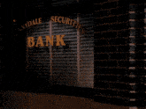 a woman holding a bag in front of a sign that says innydale securities bank