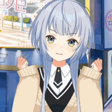 a girl with long white hair and blue eyes is standing in front of a building