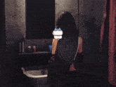 a woman in a crop top is standing in front of a bathroom sink
