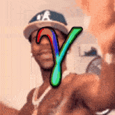 a man wearing a new york yankees hat has the letter y on his chest