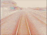 a painting of a train track with a rainbow of colors .