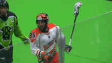 a lacrosse player with the number 95 on his shirt