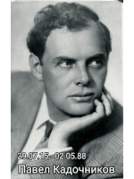 a black and white photo of a man with his hand on his chin