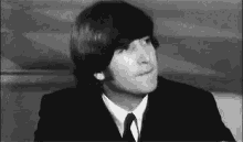 The Beatles John Lennon GIF - The Beatles John Lennon Lip Bite GIFs
