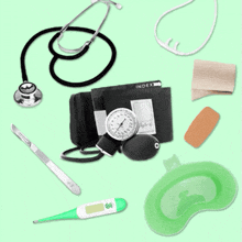 a green thermometer with the letter s on it is surrounded by other medical items