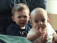 Ouch Charlie GIF - Siblings Baby Kid GIFs