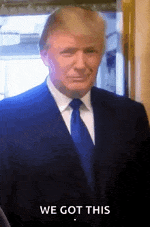 donald trump is wearing a suit and tie with the words we got this below him