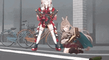 a couple of anime girls are standing next to each other on a sidewalk .
