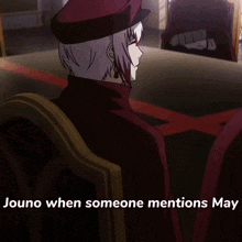 a man in a hat sits in a chair with the words " jouno when someone mentions may " above him