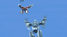 a robot is flying in the sky with its arms outstretched