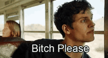 a man is sitting on a bus with the words bitch please on his face
