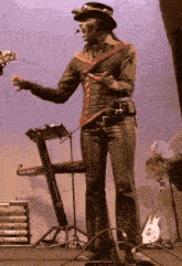 a person standing in front of a keyboard that says ' fender ' on it