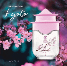 a bottle of avon kyoto flower perfume surrounded by pink flowers
