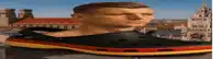 a man 's head is sitting on top of a black and yellow shoe .