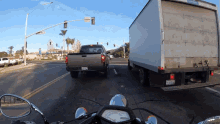 Driving Between Two Cars Motorcyclist GIF - Driving Between Two Cars Motorcyclist Motorcyclist Magazine GIFs