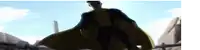 a man in a superhero costume is standing in front of a mountain