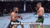 two men are fighting in a boxing ring with the words belal was winning written on the bottom
