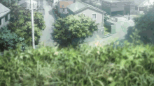 a blurred picture of a residential area with a few houses and trees