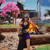 a woman in a black and purple outfit is standing in front of a fire pit
