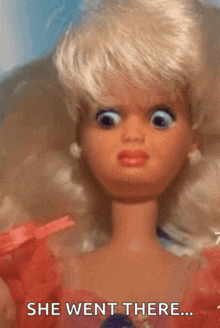 a close up of a barbie doll with the words she went there on the bottom