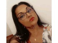 the woman is wearing glasses and red lipstick