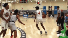 a basketball player with the number 4 on his shirt