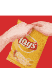 a person is opening a bag of lays potato chips