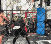 a cage with the word cage war on it