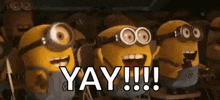 a group of minions are standing next to each other with their mouths open .