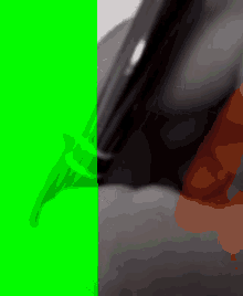 a green screen with a person holding a phone