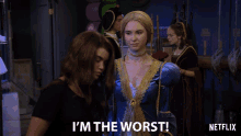 a woman in a blue and gold dress says i 'm the worst in a netflix ad