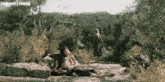 a man laying on the ground with a caption that says ' smadagor 's friend ' on it