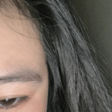 a close up of a woman 's forehead and eyebrows