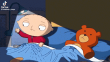 a cartoon of stewie from family guy laying in bed with a teddy bear next to him