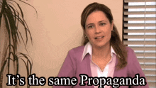 a woman says it 's the same propaganda in front of a window