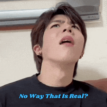 a young man making a face with the words no way that is real