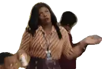 a woman with a lanyard around her neck is holding something