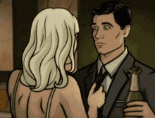 a man in a suit and tie is holding a bottle of champagne while a woman touches his tie