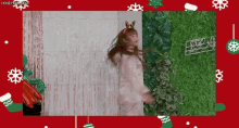 a girl wearing a reindeer headband is dancing in front of a green wall with christmas decorations .
