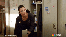 a nbc ad for chicago fire shows a woman getting ready