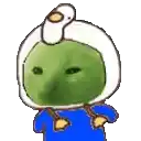 a green frog with a white duck on its head is wearing a blue shirt .