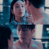 a man and a woman are looking into each other 's eyes while a man is naked