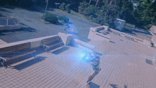 a person standing on a brick walkway with a blue light coming out of their hand
