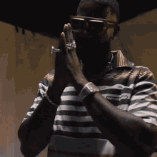 Praying Gucci Mane GIF - Praying Gucci Mane Serial Killers Song GIFs
