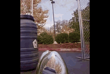 a black barrel with a sticker on it that says " warning "
