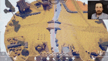 a man is playing a video game with a start and clear button